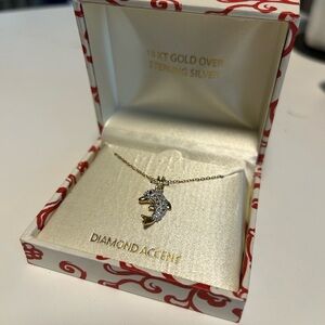Diamond Accent Dolphin Necklace in Gold and Silver